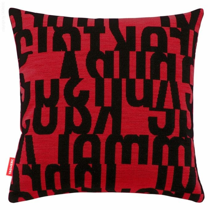 The cushion by TAGWERC with the letters pattern in black and scarlet by designer Gunnar Aagaard Andersen.